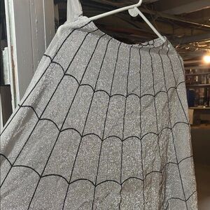 Silver Spider Web Patterned cape/poncho.